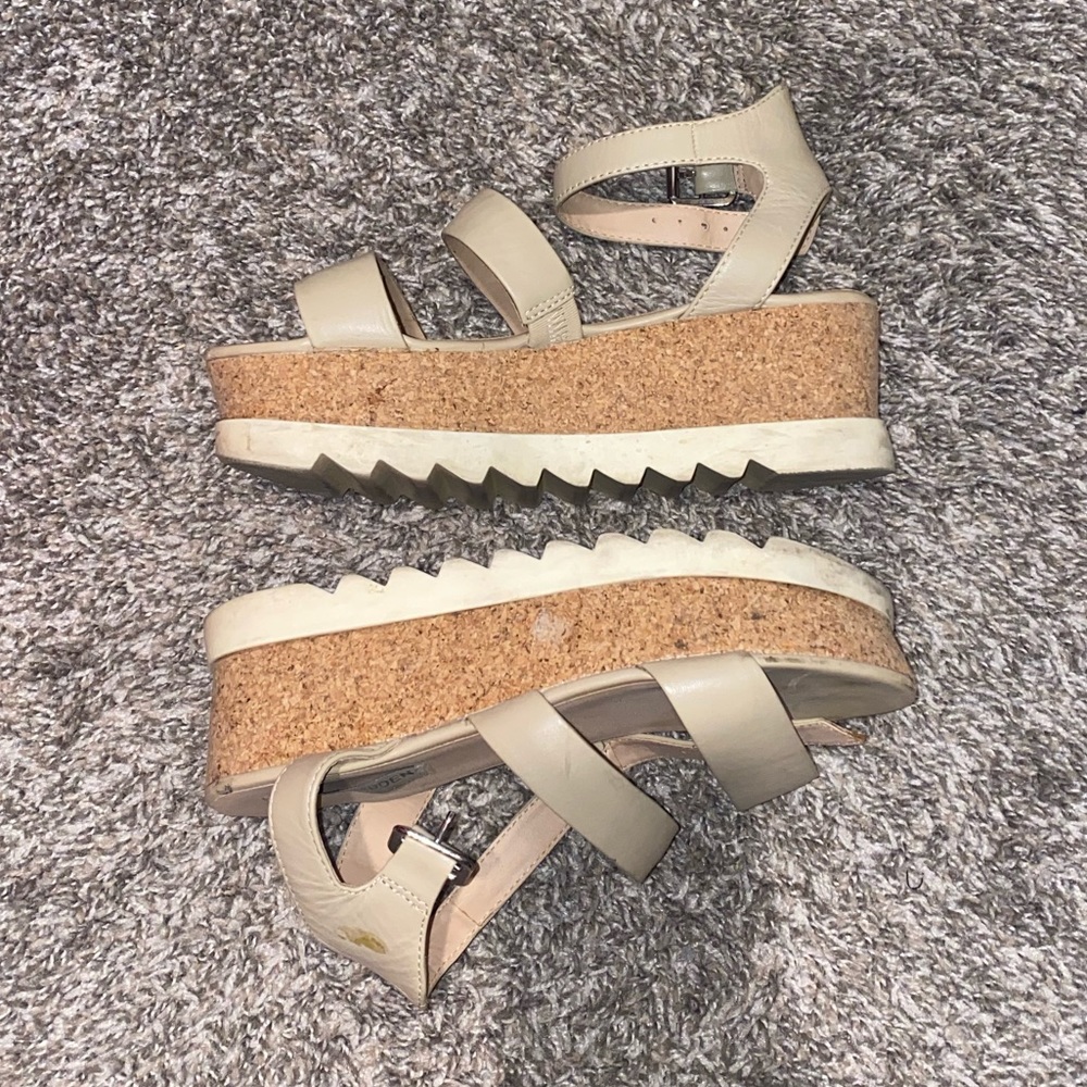 Steve Madden platform sandals.